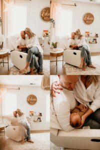 Mom and dad holding their newborn on their couch for family newborn photos.