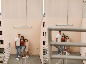 Family of 3 posing for family photos in Marietta, GA