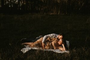 Couple posting for maternity photos in Marietta, Ga
