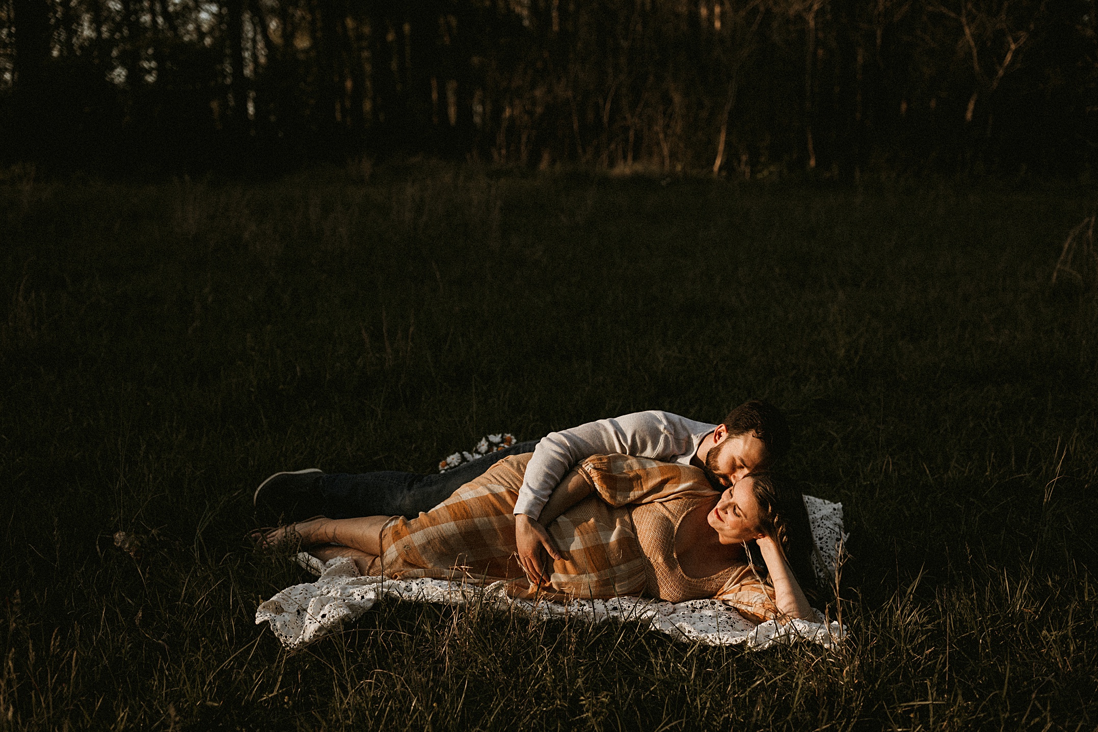 Couple posting for maternity photos in Marietta, Ga