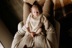 family holding their newborn baby girl